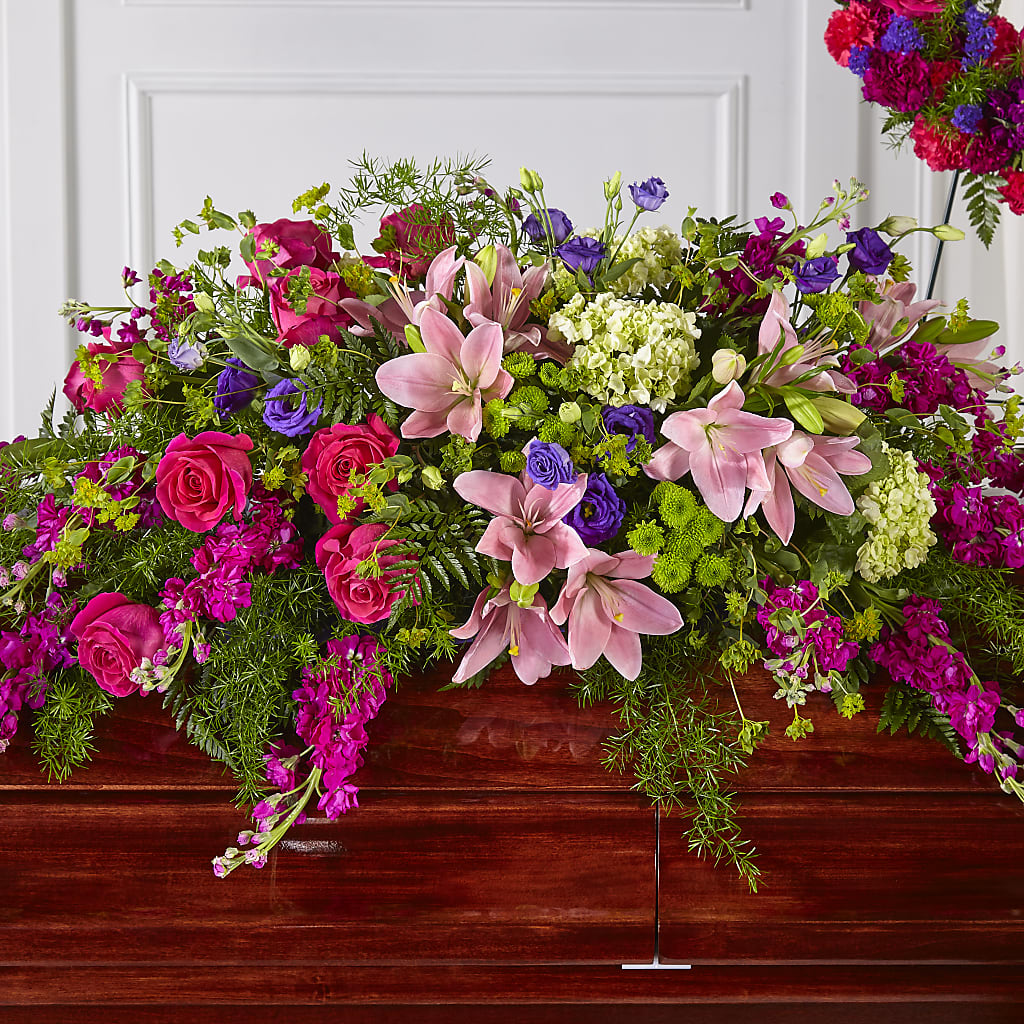 Radiant Tribute Casket Spray – CARMIN'S FLOWER SHOP, Laredo TX