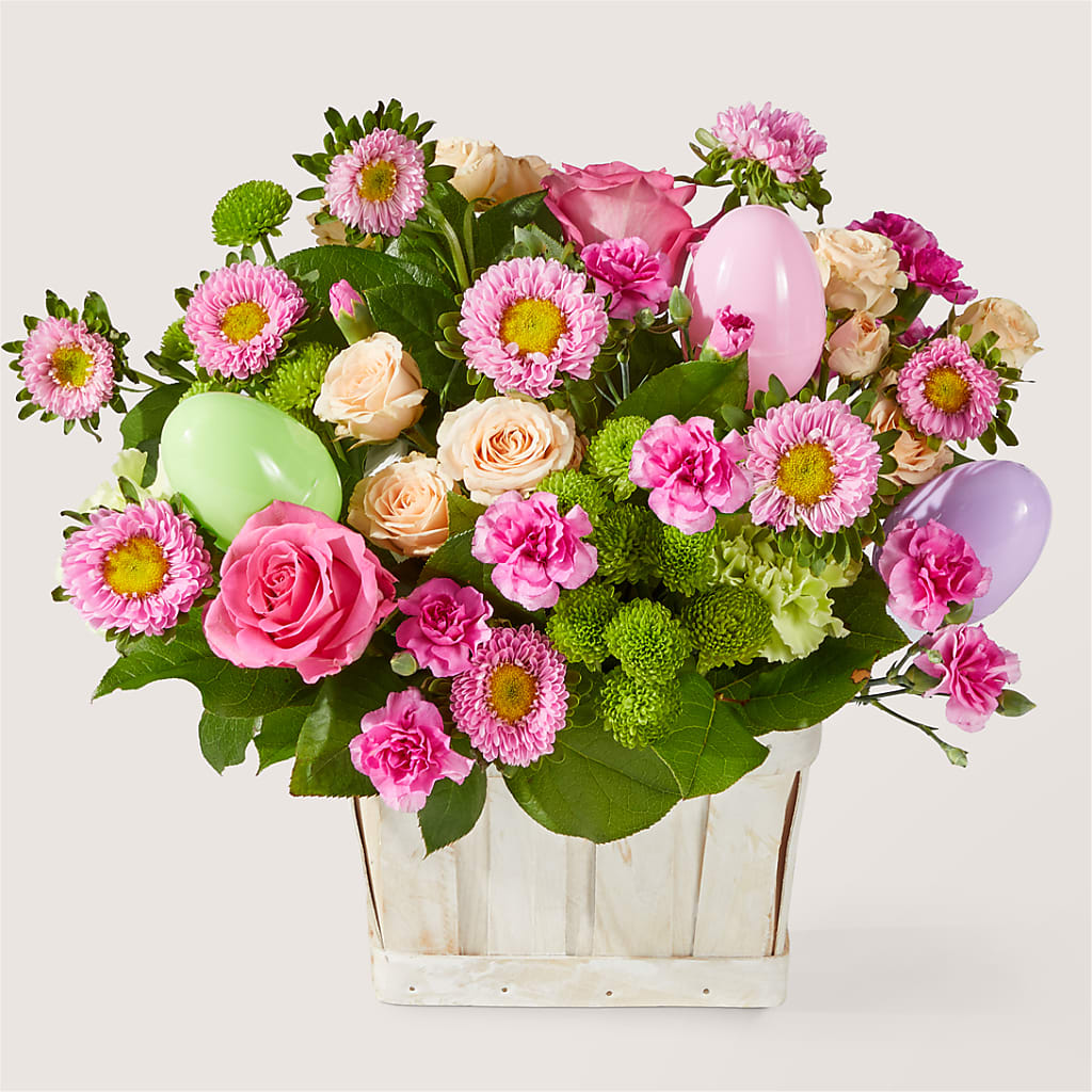 Get Eggcited Basket – green, peach, pink flower arrangement